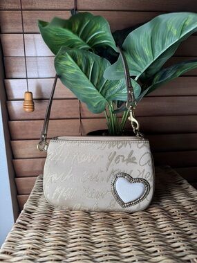 Coach Beige Script Wristlet with Heart Patch